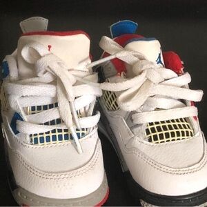 Kids Jordan 4 ‘What The’ Sneakers